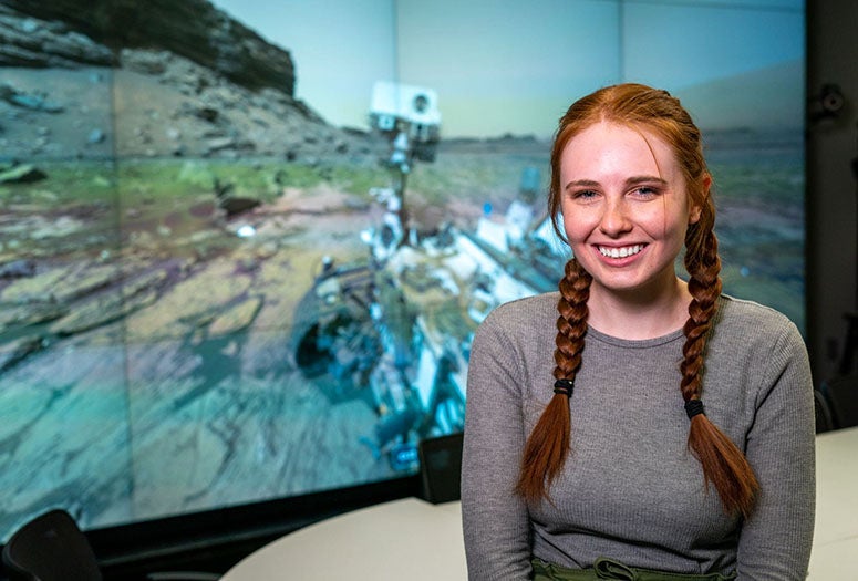 Madison Morris watches the Mars landing