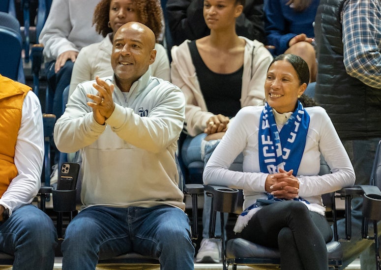 Rice President Reginald DesRoches and his wife, University Associate Paula DesRoches, cheer on the men's basketball team Jan. 27 at Tudor Fieldhouse.