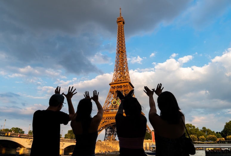 students next to Eiffel Tower