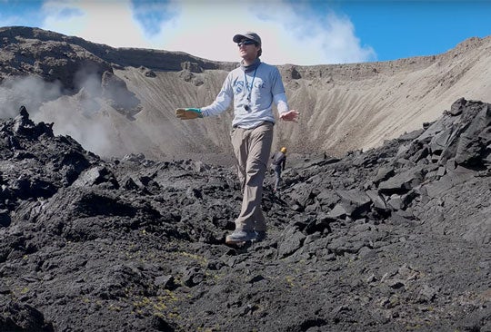 Graduate student Patrick Phelps at the caldera of Chile’s Cordón Caulle volcano in March 2022