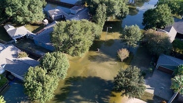 An aerial shot of a neighborhood flooded during Hurricane Harvey.