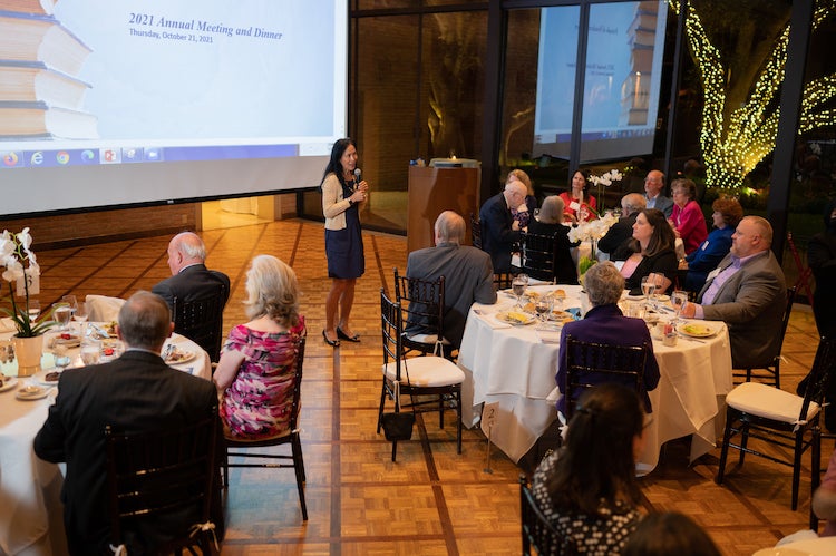 Rice University Representative Y. Ping Sun addresses the Friends of Fondren Library at the Cohen House.