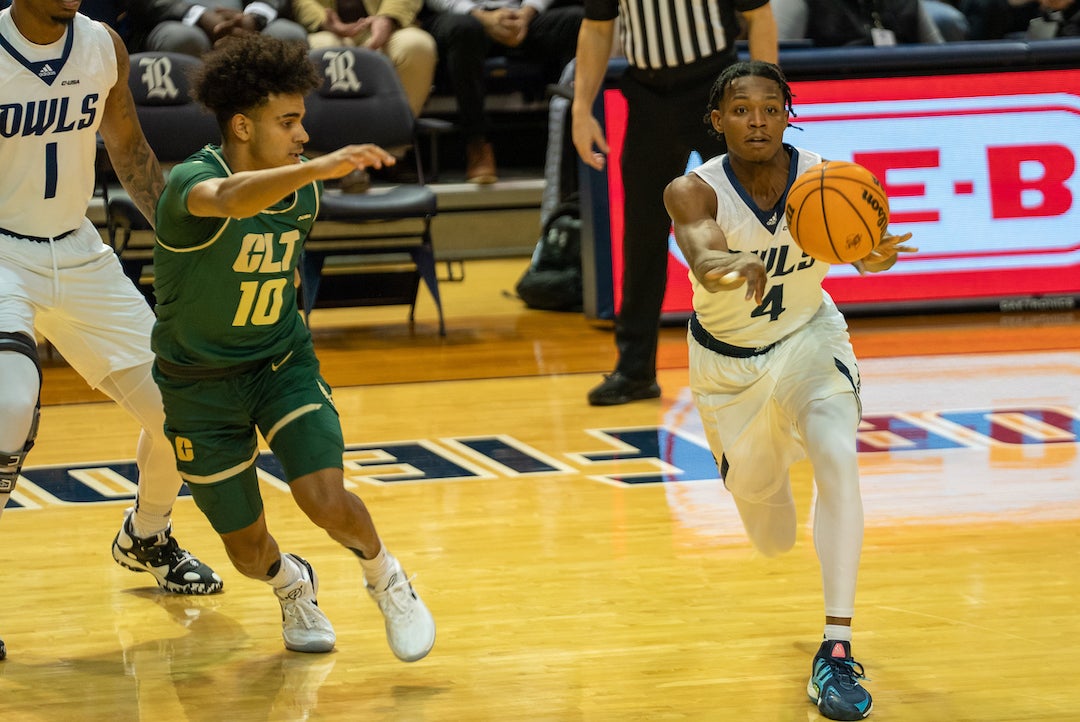 Rice basketball player Quincy Olivari makes a pass against Charlotte Jan. 26 at Tudor Fieldhouse.