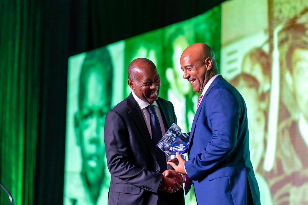 Rice President Reginald DesRoches presents Houston Mayor Sylvester Turner with the 2023 Stephen L. Klineberg Award.