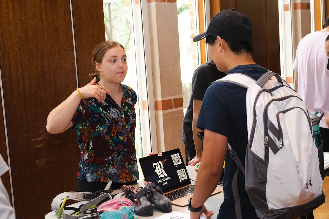 Students at booth at Student Activities Fair